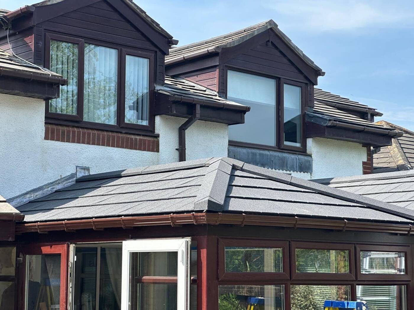 Insulated conservatory roof upgrade in Devon with anthracite tiled finish