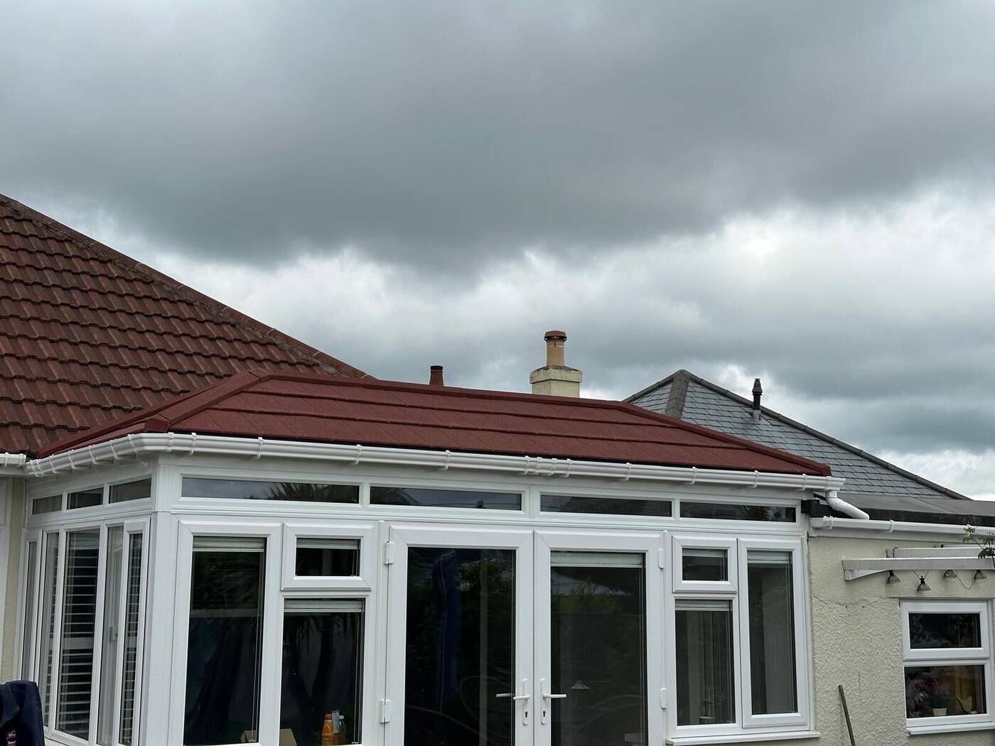 Terracotta red tiled conservatory roof on a Plymouth bungalow