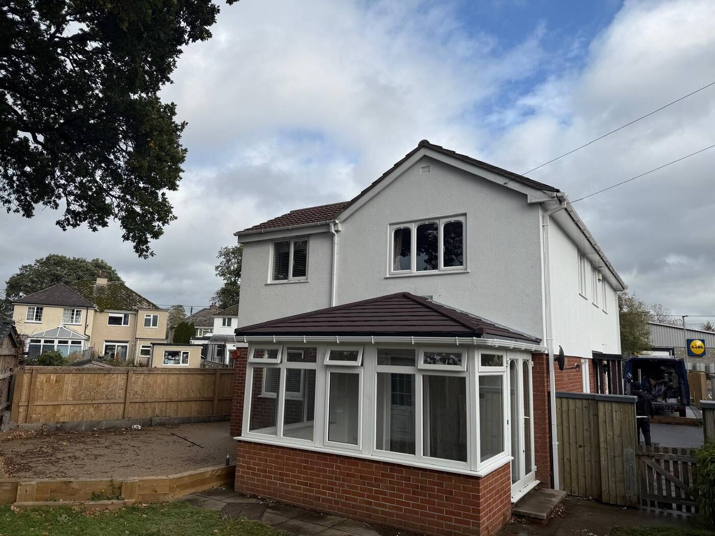 Insulated tiled conservatory roof on a brick-built conservatory